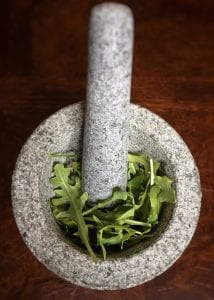 Mortar and Pestle with Arugula (Rocket)