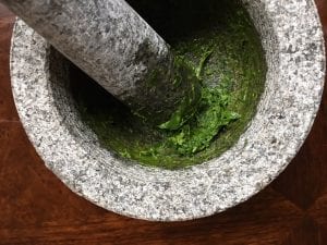 Mincing Herbs with a Mortar and Pestle
