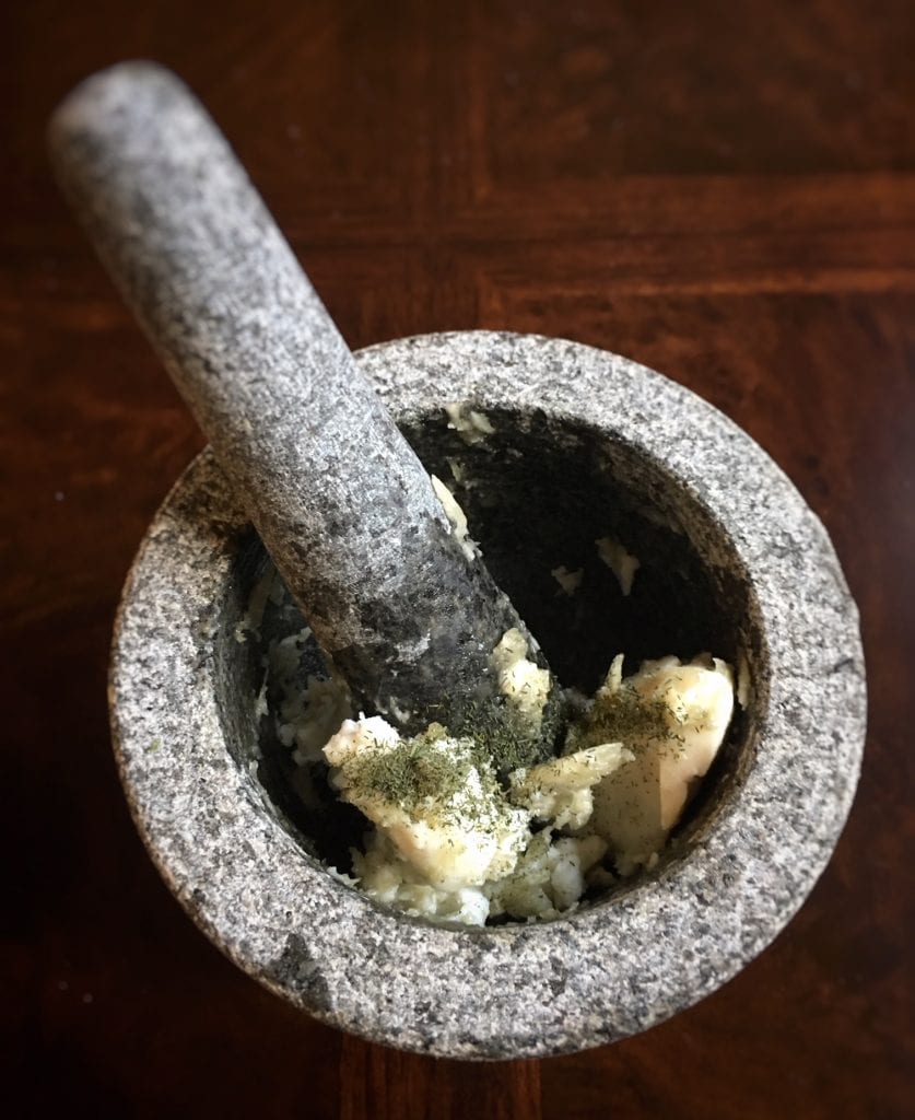 Aged goat cheese pulverized with garlic.