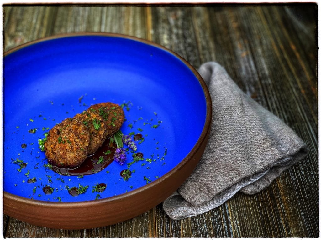 Kneaded Rissole of Spelt and Fava Beans with a Caraway and Red Wine Reduction | Tavola Mediterranea