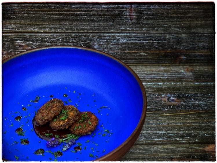 Kneaded Rissole of Spelt and Fava Beans with a Caraway and Red Wine Reduction | Tavola Mediterranea